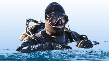 Dry suit diver on the surface